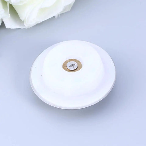 Drain Stopper Flat Cover 40-45mm Stainless Steel for Bathtub with white silicone surface and central screw for easy installation.