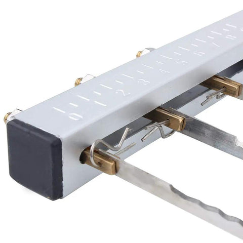Close-up of Adjustable Cake Leveler And Wire Slicer For Even Layer Cakes Pro Grade Stainless Steel Cutter with measurement markings.