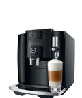 Top Shelf Fourth Generation Automatic Coffee Machine In Piano Black pulls barista grade espresso and creamy lattes with sleek design.
