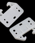 Banish Sticking Drawers Forever With These White Plastic Center Mount Slide Kits showing two slider brackets with holes for easy installation.