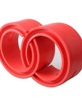 Universal Two Piece Red Rubber Shock Absorber Bushings For Heavy Hauler Car Suspension Tuning shown from above, highlighting their durable design.
