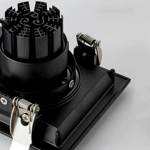 Close-up of Six Pack Sleek Gimbal Eyeball Canless Downlight Recessed Lighting Kit showing black aluminum fixture and spring clips.