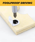 Close-up of a 100 Pack Size Six Black Truss Head Self Tapping Screws for Wood Sheet Metal and Plastic Stainless Steel 304 Rust Resistant with Black E Coating Phillips Bit Included One Inch Length being inserted into wood.