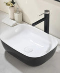 18x13 Inch Black Vessel Sink For Bathroom, Oval Ceramic Basin With Durable Glossy Finish, countertop view with tap