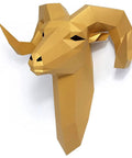 Golden paper sculpture of a ram's head with geometric design, ideal for wall decor or art display.