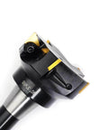 Indexable end mill with R8 shank, 3-inch cutting diameter, 6-inch overall length; close-up view of carbide inserts.
