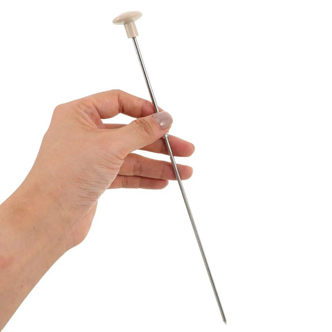 Hand holding Sturdy Metal Binding Pin For Office And School Use Precise File Aligning Locating Pin For Binding Hole Alignment Archive Punch Peg
