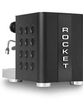 Top Shelf Espresso Machine And Heavy Duty Conical Burr Coffee Grinder Duo Featuring E Six One Group Head Heat Exchanger For Simultaneous Brewing And Milk Steaming On A Compact Desktop Stand That Delivers Shop Quality Sips Daily, in sleek black design with rounded edges and steam wand.
