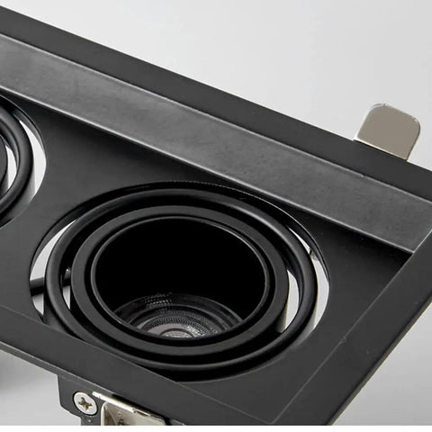 Close-up of Six Pack Slick Adjustable Gimbal Eyeball Canless Downlight LED Dimmable Recessed Light featuring a black trim.
