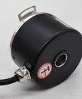 Close-up of a Built Tough 60mm Outer Diameter Hollow Shaft Rotary Encoder with 10mm Aperture, industrial-grade black housing.