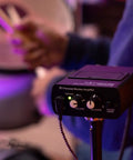 S1 Personal In-Ear Monitor Headphone Amplifier for Drummers, Keyboardists, Guitarists, shows volume controls, on stage.