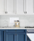 Matte Black 2 Inch Cabinet Knobs 30 Pack Stainless Steel Kitchen Cabinet Knobs With Round Edge for kitchens shown on white cabinets