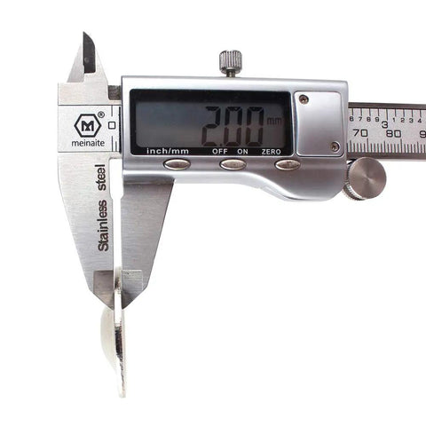 Close-up of digital caliper measuring thickness of washer from 20 Piece UTV Skid Plate Bolts and Washers Kit for Polaris.