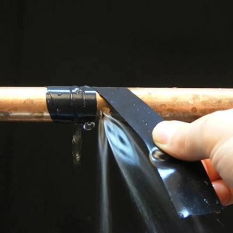 Applying Self Fusing Silicone Tape 16.4ft Waterproof Heat Resistant Repair Tape For Emergency Fixes on a leaking pipe