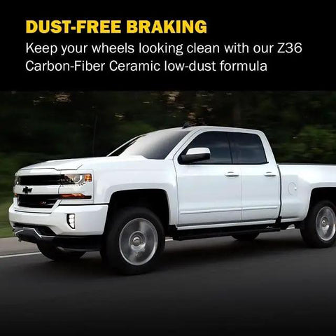 White pickup truck showcasing dust-free braking with Z36 carbon-fiber ceramic brake pads. Front Brake Pads Upgrade For Dodge Dakota 2005-2010, Durango 2007-2009, Ram 1500 2006-2010, 2011-2018 With Z36 Truck Tow Carbon Fiber Ceramic Brake Pads And Installation Hardware.