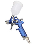 Top Tier Hvlp Gravity Feed Spray Gun Precision Zero Point Eight Millimeter Tip Tough Aluminum Body with white paint cup.