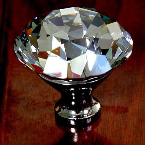 Modern Diamond Head Glass Crystal Cabinet Pulls Featuring A Slick Silver Clear Coating And Solid 50Mm Diameter Build For Kitchen Cupboards Drawer Hardware That Hits Different, viewed from the side.