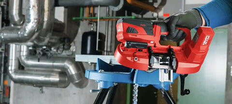 Cordless Band Saw With 22V Battery And LED Light For Cutting Up To 64 mm And 2 1/2 Inch Thick Materials in workshop setting