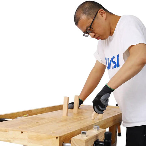 Person using 55 Inch Heavy Duty Rubber Wood Workbench With 3 Drawers Storage Cabinet Tool Well And Adjustable Vise for woodworking