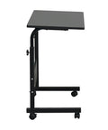 Slick Rolling Adjustable Height Computer Desk With Secure Locking Casters Heavy Duty Steel Frame And Scratch Resistant Top Mobile Standing Laptop Workstation For Tight Home Offices side view of black desk