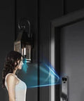 Slick Smart Door Lock Featuring Built In Camera Voice Intercom And Fast Fingerprint Scan Password Entry Along With Hella Secure Auto Deadbolt Delivering Darn Top Shelf Protection Always with woman using intercom.