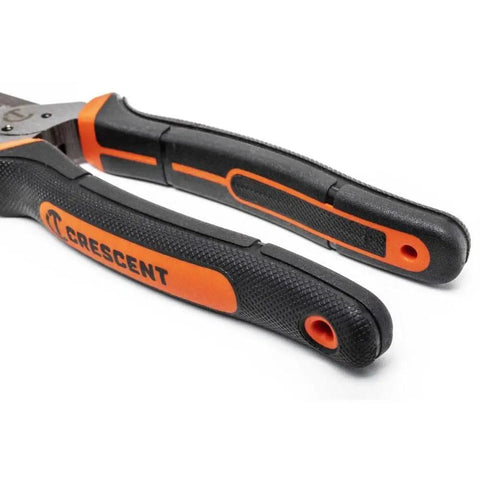 Close-up of TPR grips on heavy duty 8 inch wire stripper tool with integrated shear cut cutter and drop forged steel blades.