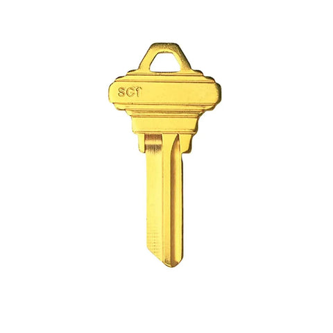 SC1 Brass Finish Key Blank, single uncut key displayed upright, compatible with SC locks, easy to cut and customize for locksmiths.