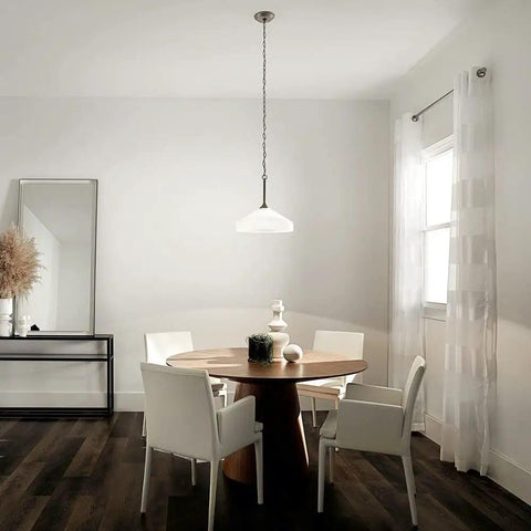 Swanky 15 Inch One Light Pendant in satin etched glass with brushed nickel finish over dining table in modern decor