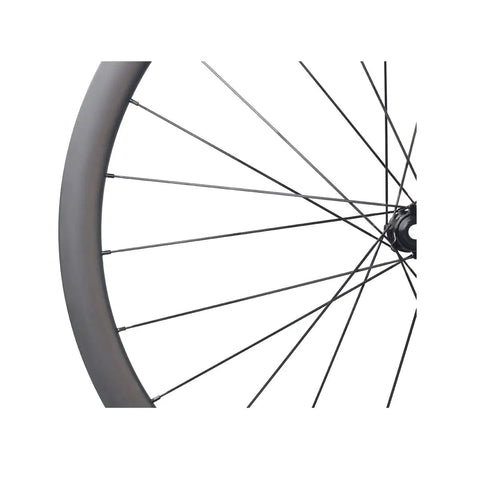 Close-up of 700C Carbon Disc Wheelset 38mm Clincher Road Bike Wheels Centerlock With Sapim Spokes For Slick Aero Ride