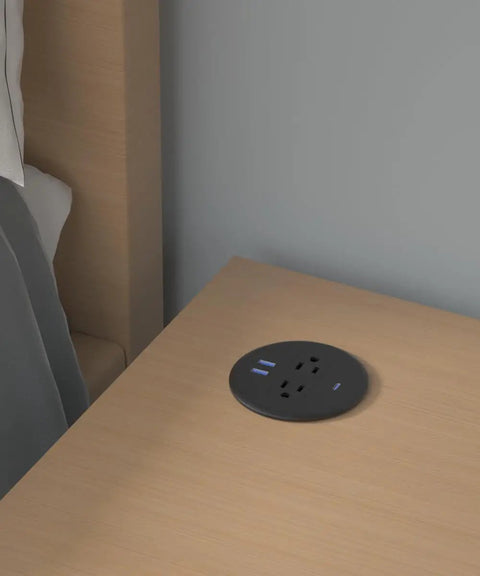 Two Pack Desktop Power Grommet PD20W Fast Charging USBC three inch round flush mount desk outlet on wooden table.