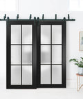 Heavy Duty Barn Bypass Sliding Closet Doors 72 By 96 Inches Frosted Glass Modern Wood Look With Black Matte Finish and Kickass Hardware Kit displayed indoors.