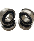 Front Wheel Bearing Conversion Kit For Riding Lawn Mowers, two metal bearings with black seals, close-up view