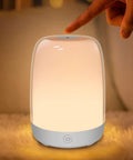 Touching top of Nursery Night Light For Kids With Dimmable Warm White Glow And 5 Color Changing Modes, USB Rechargeable Lamp