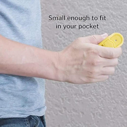 Hand holding a compact yellow BSTiltion Magnetic Stud Finder for Wall Mounting Projects, designed for easy pocket storage.