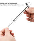 Close-up of CZC Auto pencil tire pressure gauge with dual-head chuck, stainless steel stem, 10–120 PSI, silver, 2-pack