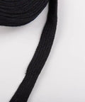 Close-up of black cotton ito sageo cord for katana tsuka handle, 400 cm long, versatile binding rope for DIY wraps.
