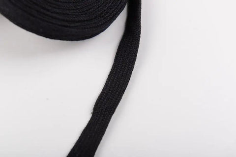 Close-up of black cotton ito sageo cord for katana tsuka handle, 400 cm long, versatile binding rope for DIY wraps.