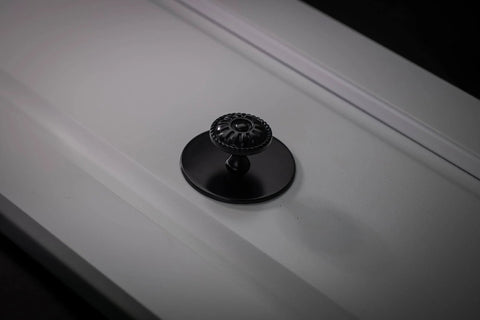 Matte Black Escutcheon Back Plates For Cabinet Knobs And Doors Four Pack Round Rosette Plate Two And One Third Inch Heavy Duty Die Cast Zinc Ideal For Bifold Closet Doors Door Pulls And Handles installed view