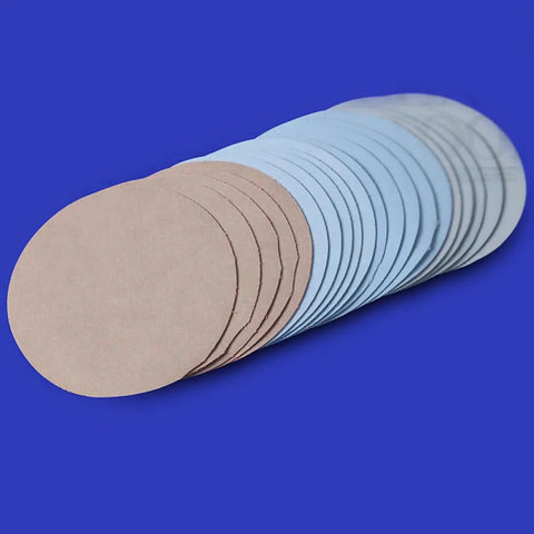 Premium Flocking Hook And Loop Sanding Discs Set For Electric Sander, assorted grit abrasive pads in a stack for detailed cleaning jobs.