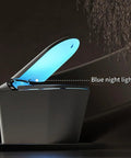 Slick Black Smart Toilet With Built In Bidet And Heated Seat Offering Pre Wet Rinse And Adjustable Warm Water Streams For A Legit Top Shelf Fresh Setup Straight Up with blue night light feature.