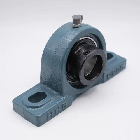 Top Shelf 1 1/4 Inch Pillow Block Ball Bearing Housing With Rock Solid Locking Collar angled view, blue cast iron, designed for heavy machinery.