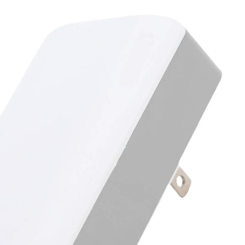 Portable 2600mAh Uninterruptible Power Supply With US Plug Emergency Battery Backup For Routers And Laptops close-up of white and gray adapter
