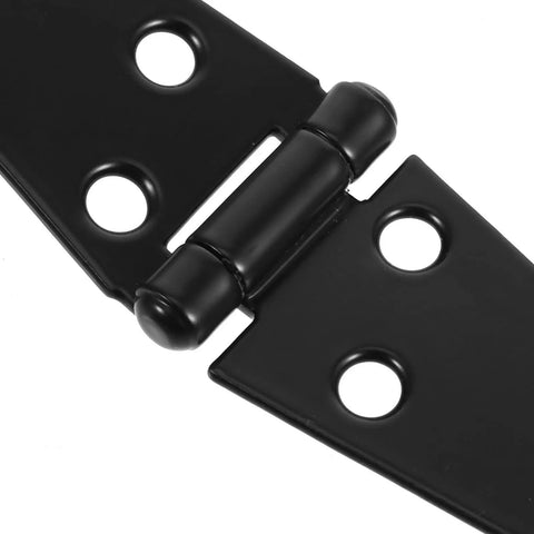 Close-up of heavy duty galvanized iron strap hinges with screws for yard gates and barn doors outdoor gate hardware.
