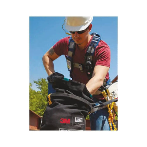 Worker using Canvas Spill Control Safe Bucket With Six D Ring Points And A Durable Hook And Loop Closure For Quick Worksite Use