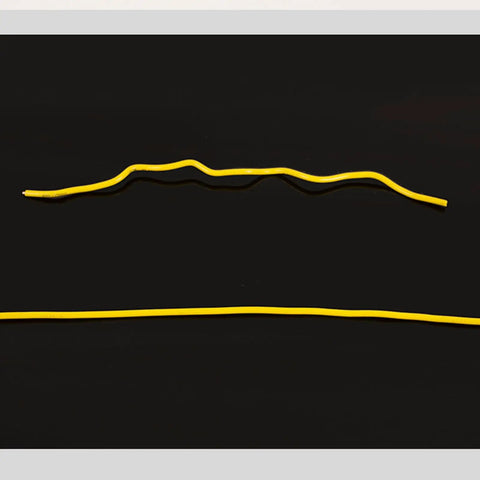 Manual Wire Straightener Tool aligning frayed yellow wires on a black background for precision electrical work.