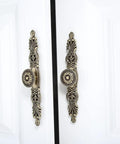 Vintage Cabinet Pulls Set of 5 in Antique Bronze With 3.7 Inch Hole Spacing on white doors