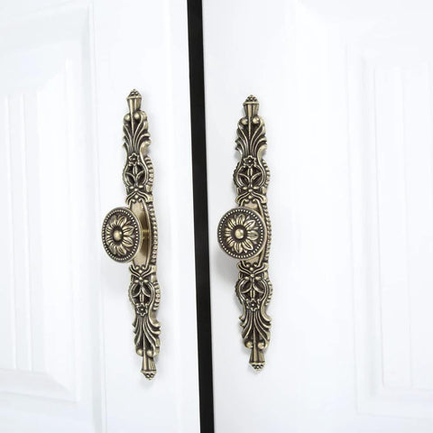 Vintage Cabinet Pulls Set of 5 in Antique Bronze With 3.7 Inch Hole Spacing on white doors