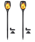 Two Pack 33 Inch Solar Tiki Torches With 96 LED Flickering Flame Waterproof Outdoor Lights For Garden Yard Pathway And Holiday Decor Auto On Off From Dusk To Dawn Three Modes Flame Breathing And Steady For Realistic Ambiance, shown with installation accessories.
