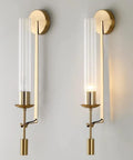 Modern Long Tube Wall Sconce In Brushed Gold Metal And Frosted Glass Casting A Super Chic Warm Glow to living space, elegant design.