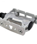 Close-up of a track style bike pedal with alloy body and cage, chromoly axle, nine sixteenth inch, silver finish, toe clip compatible.
